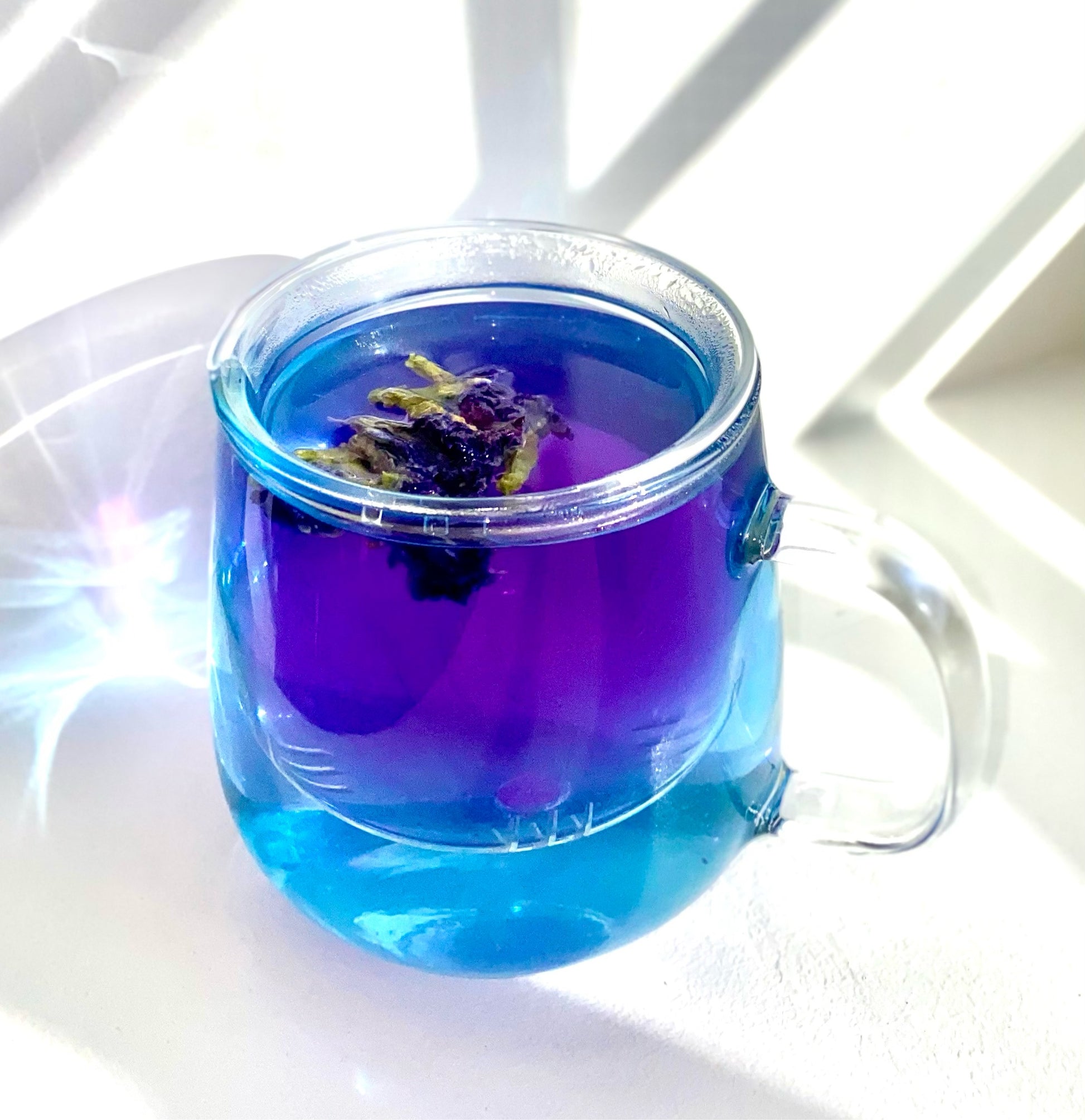 Butterfly Pe Flower Tea turns from blue to purple when you add key limes to it